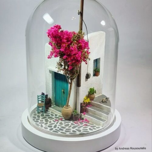 Clay Miniatures in a Glass Dome