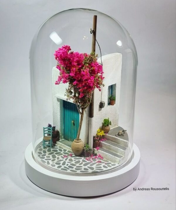 Clay Miniatures in a Glass Dome